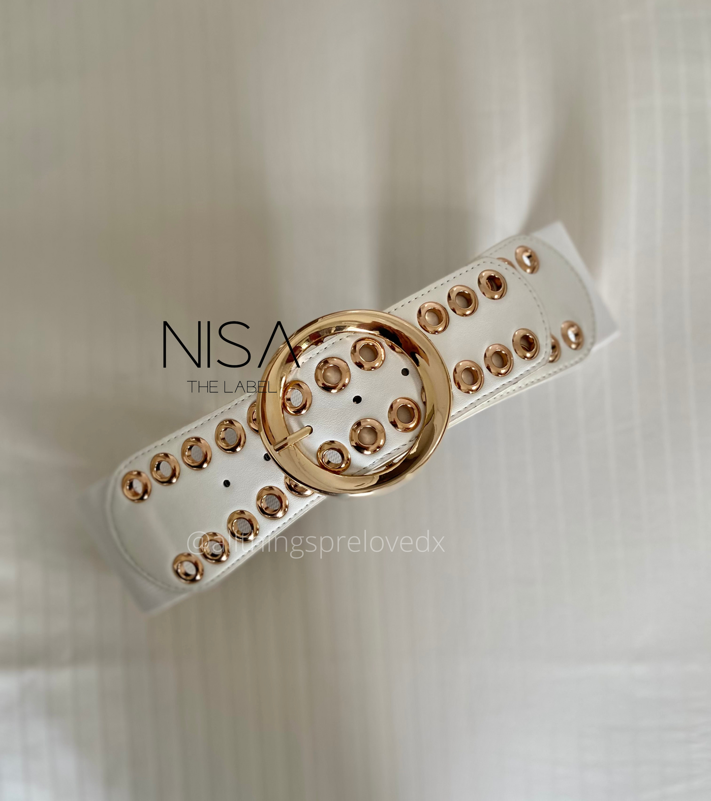 Oval gold metal buckle rimmed eyelet waist cincher belt