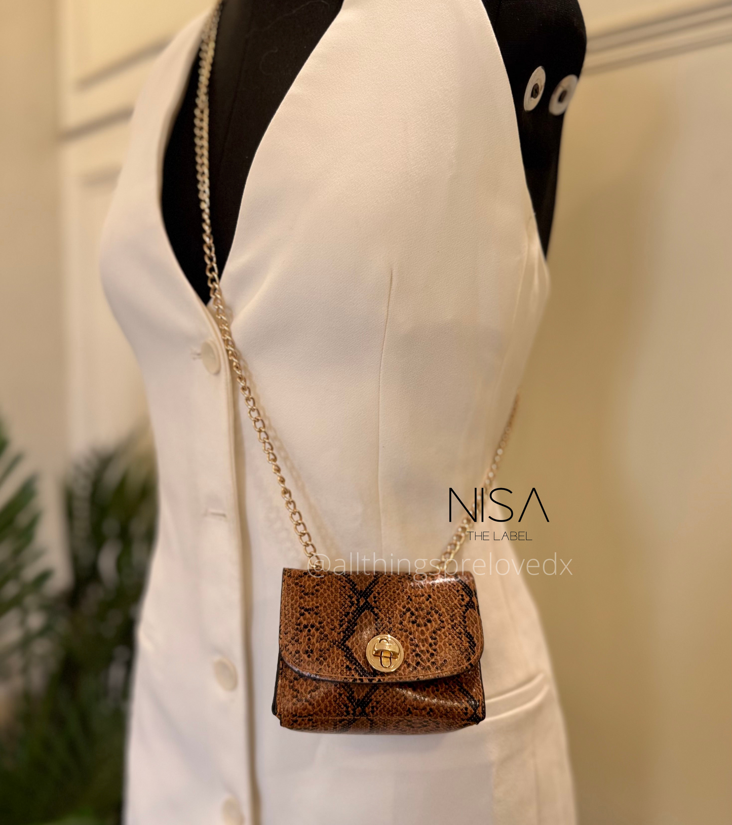 Sling micro bag with metal chain