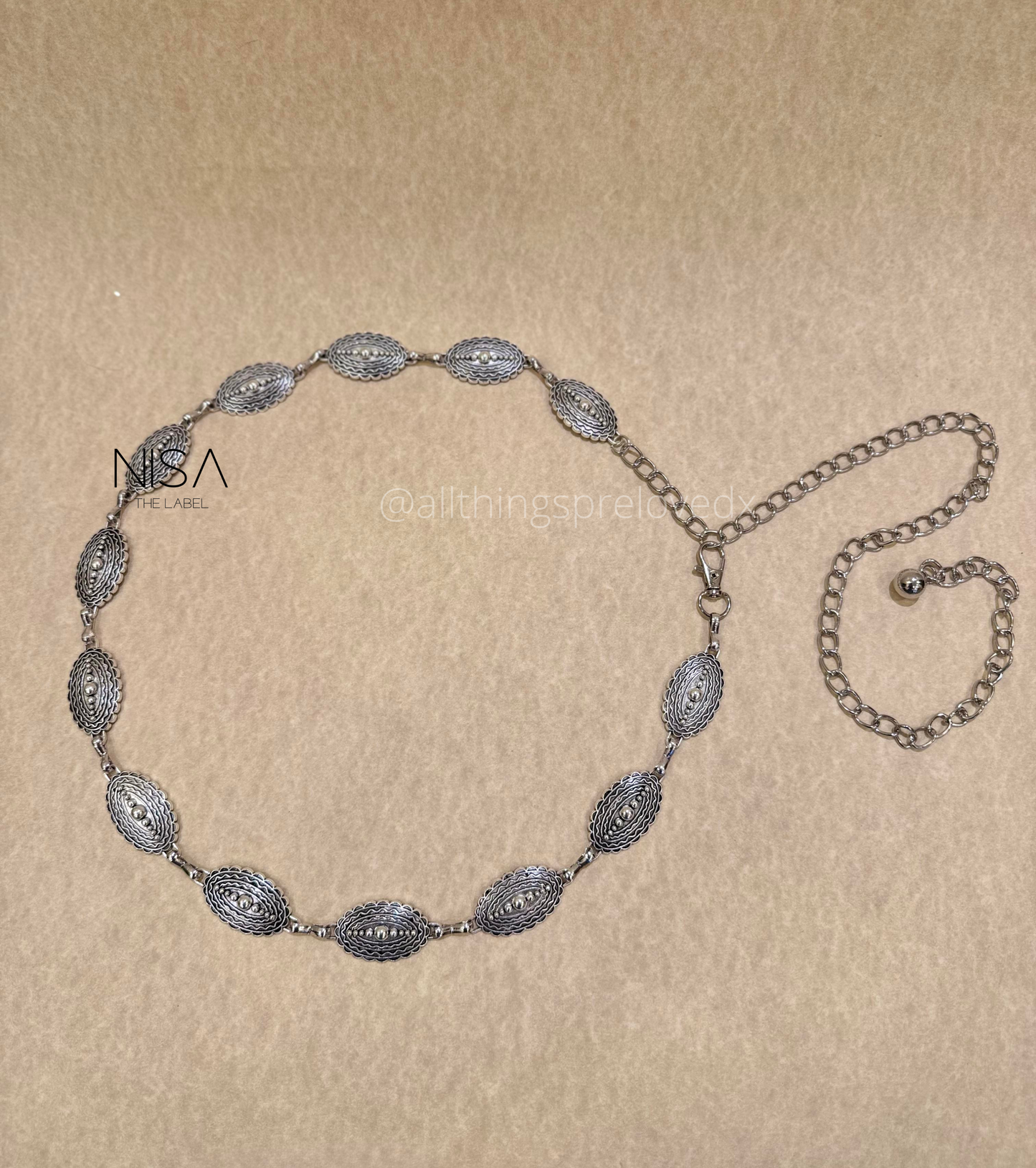 Oval matte zig zag detailed metal chain belt