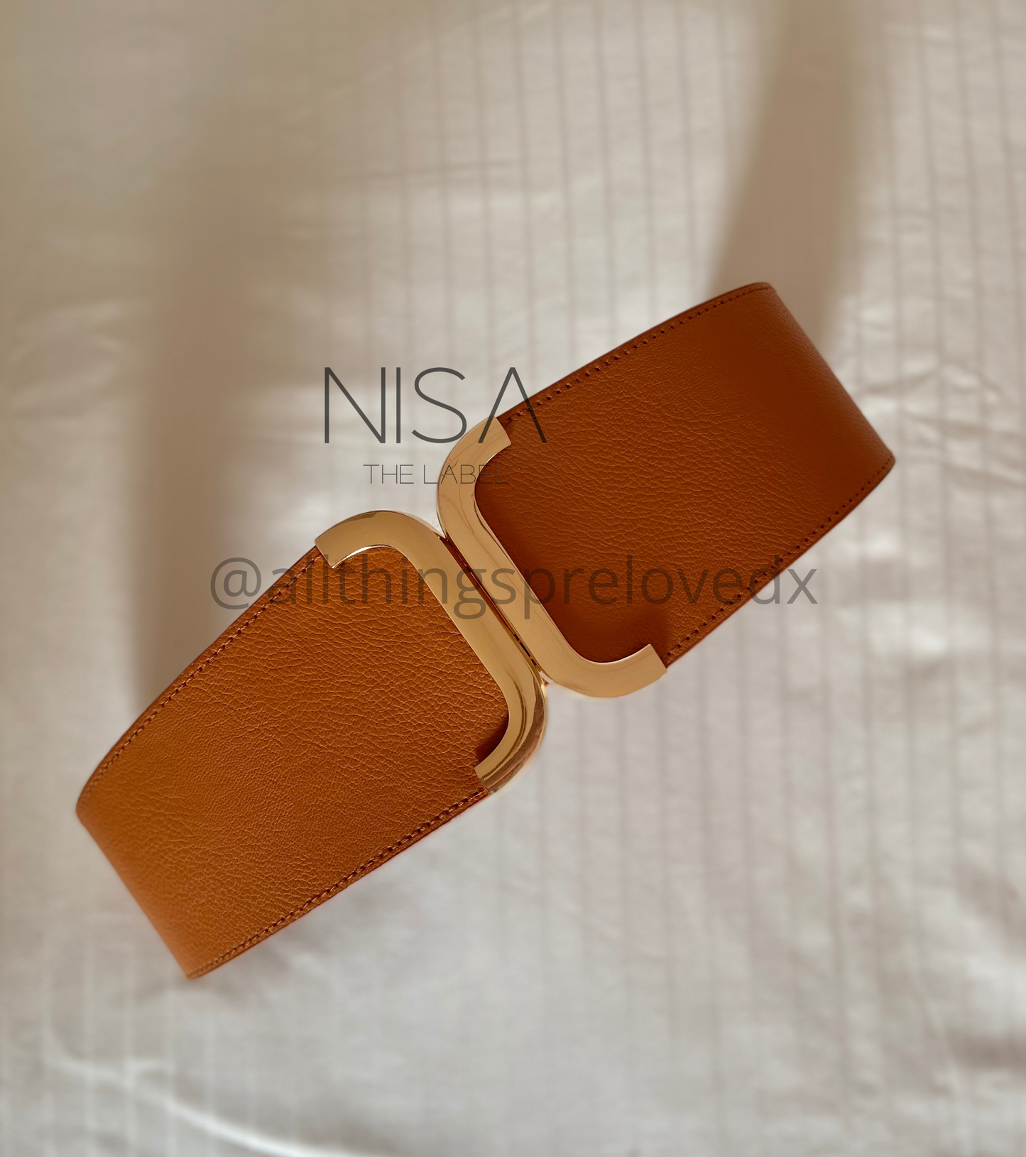 Curved golden buckle wide belt