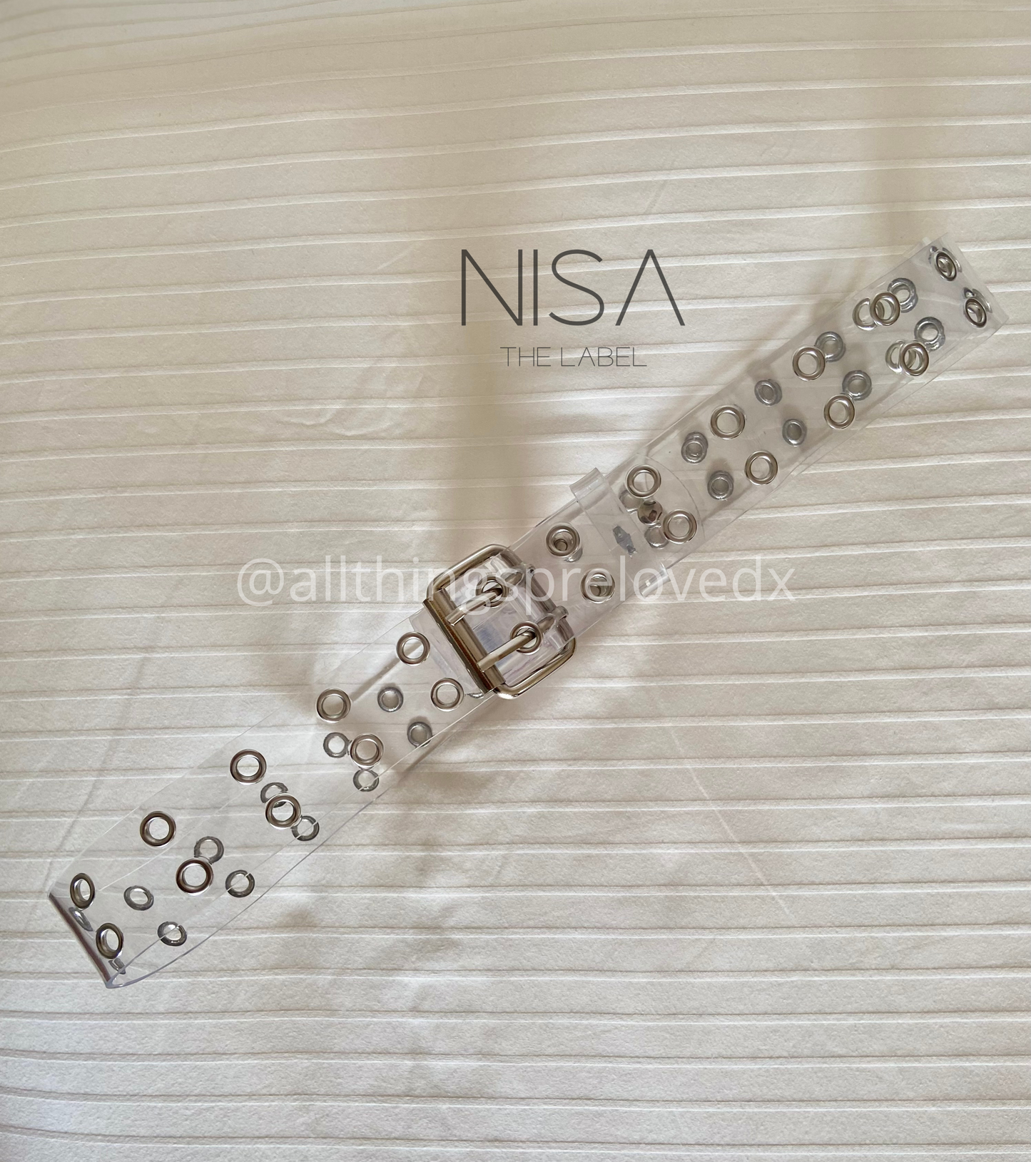 Transparent double eyelet belt