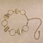 Hollow sphere wavy metallic detailed chain waist belt