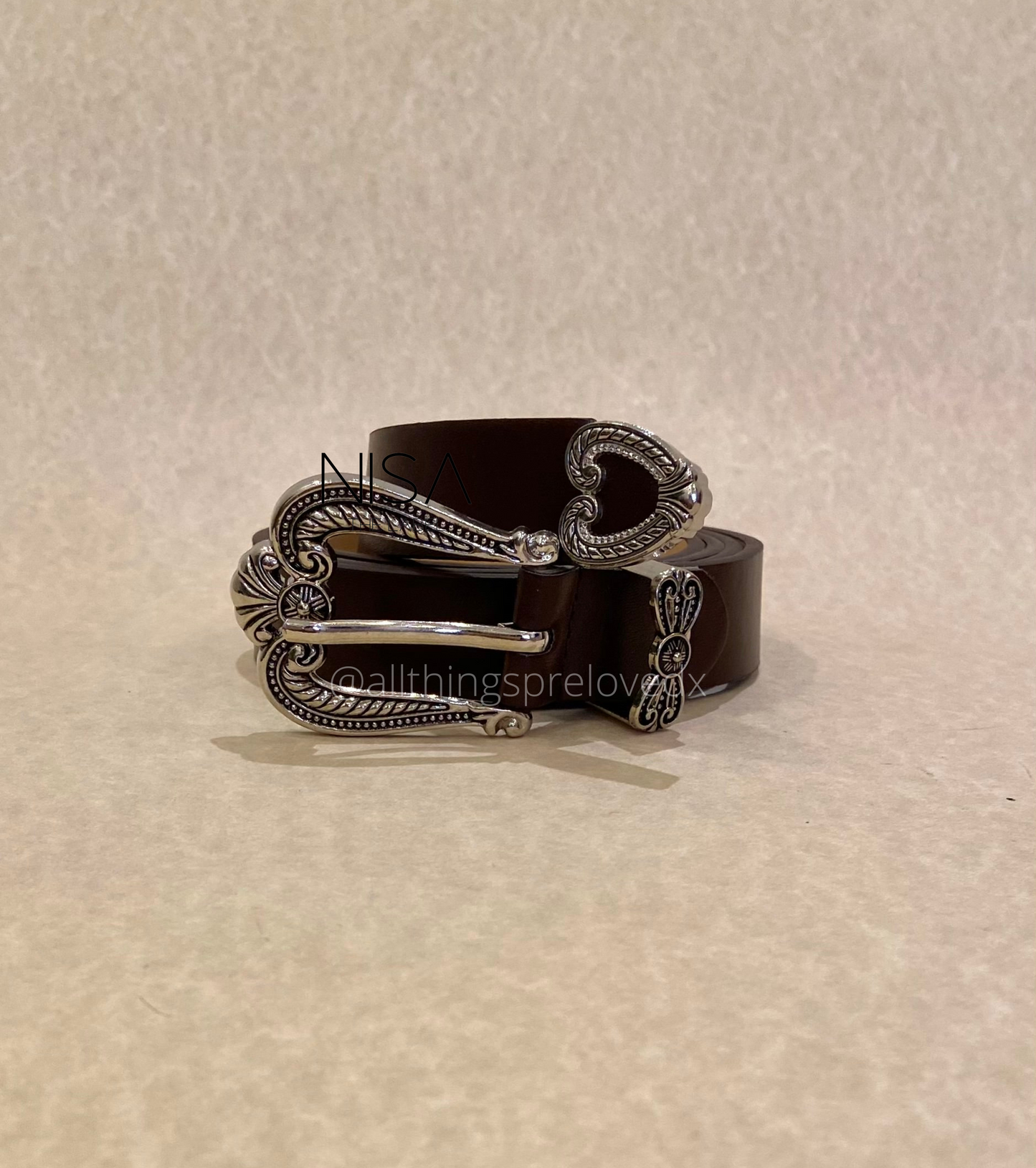 Intricate vintage metal buckle basic belt