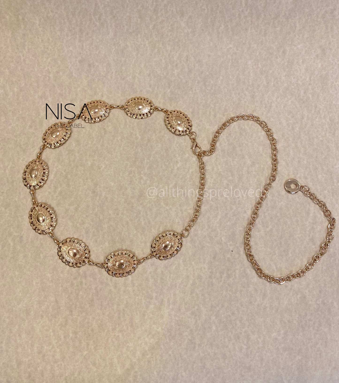 Cutwork detailed chain waist belt