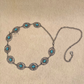 Oval intricate inset detailed turquoise metal chain waist belt
