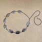 Oval floral detailed metal chain belt