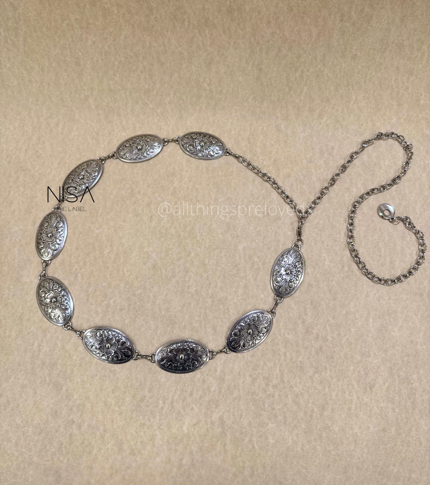 Oval floral detailed metal chain belt