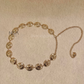 Cutwork floral inset metal chain belt