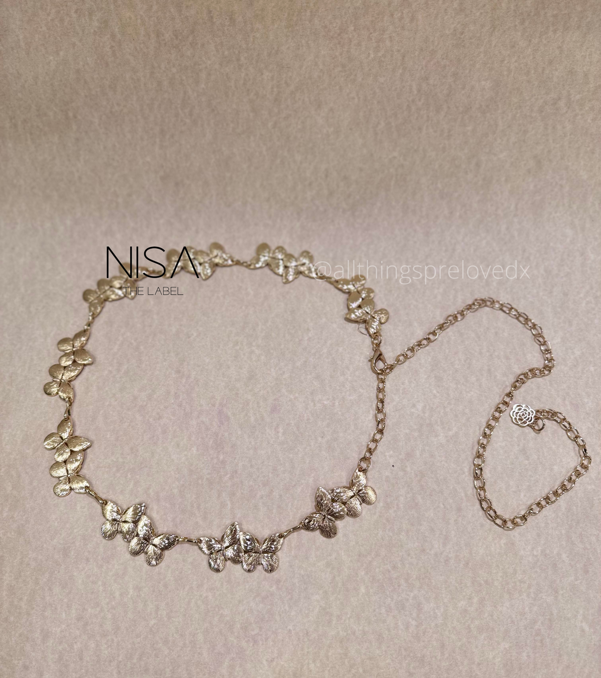 Twin butterfly metal chain belt