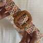 Oval buckle confetti straw woven belt